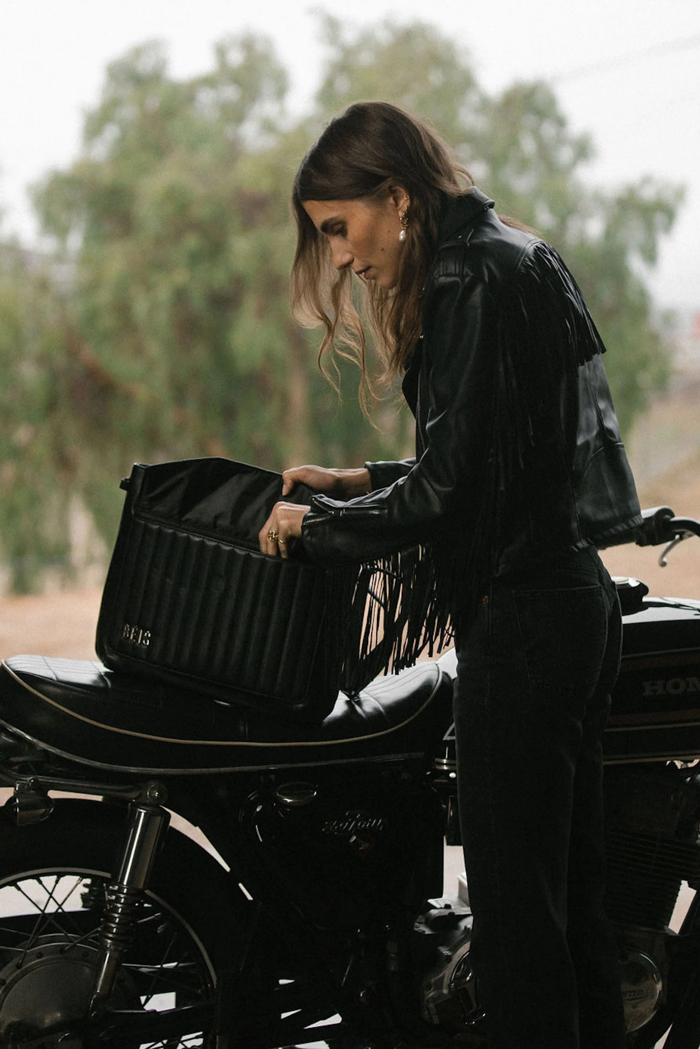 The Messenger Backpack in Black